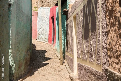 Colorful narrow cobblestone road in the ancient city of Harar, Ethiopia, a Unesco World Heritage Site photo