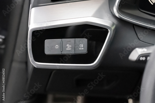 Panel with buttons for controlling the operating modes of car headlights © dimetradim