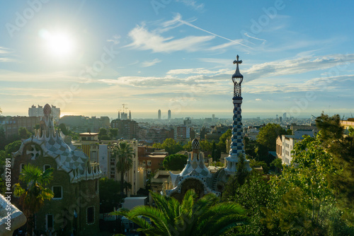 City view with a clear blue sky from the top of Park Guell in Barcelona. Park Guell is one of the famous architect Antoni Gaudi s major works. It is among the most popular tourist attractions.