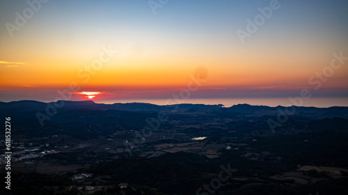 Spain, Balearic Islands, Menorca, Aerial panorama of Sanctuary of Verge del Toro at sunset © Stemoir