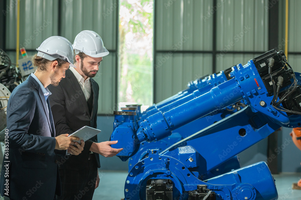 Group partner engineer assistant in helmet inspection check heavy ...