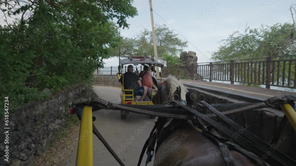 POV Riding a Carriage Horse as a Transportation in Gili Trawangan Island Indonesia POV Riding a Carriage Horse as a Transportation in Gili Trawangan Island Indonesia