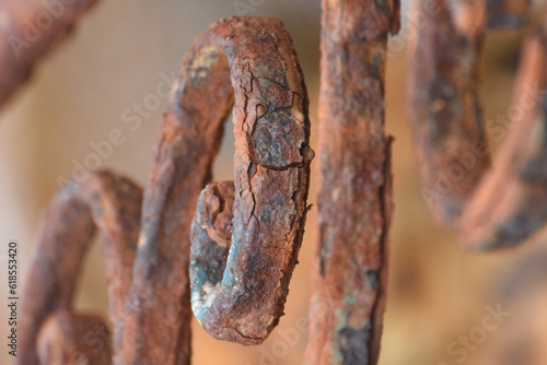 Canvas Print Destruction of metal. Rusty wrought iron fence.