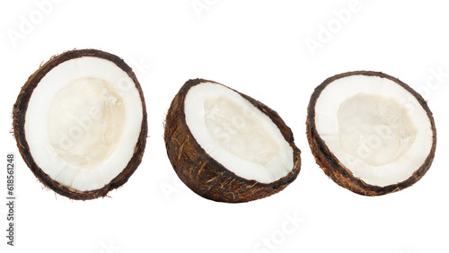 Set of whole coconuts and pieces of coconut on a white background.