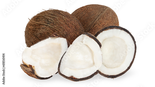 Set of whole coconuts and pieces of coconut on a white background.