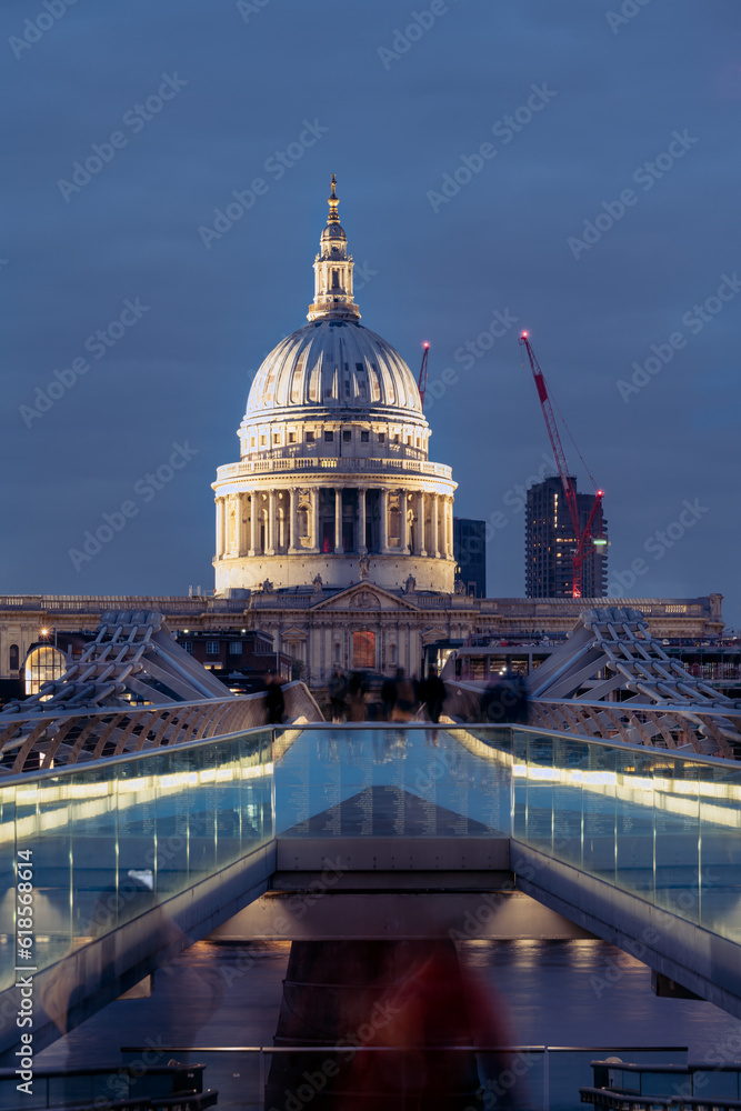 View of St Paul's cathedral dome from the millenium bridge in the evening, London, England