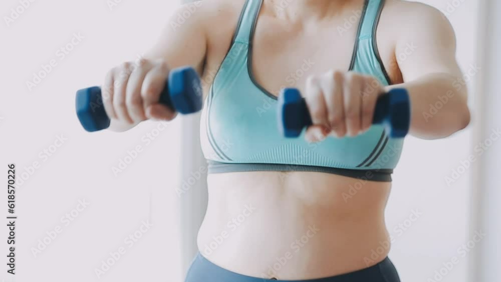 Woman exercise workout in gym fitness breaking relax holding apple fruit after training sport with dumbbell and protein shake bottle healthy lifestyle bodybuilding, Athlete builder muscles lifestyle. Woman exercise workout in gym fitness breaking relax holding apple fruit after training sport with dumbbell and protein shake bottle healthy lifestyle bodybuilding, Athlete builder muscles lifestyle.