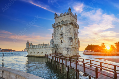 Belem Tower or Tower of St Vincent - famous tourist landmark of Lisboa and tourism attraction - on the bank of the Tagus River Tejo on sunset. Lisbon, Portugal
