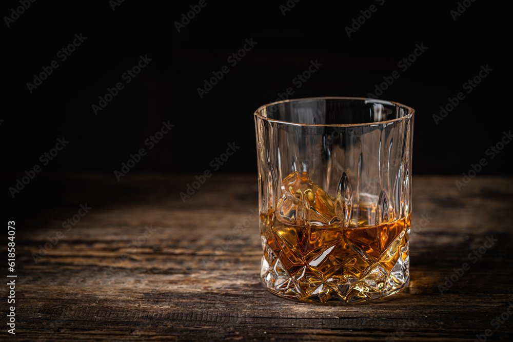 Whiskey with ice in glasses