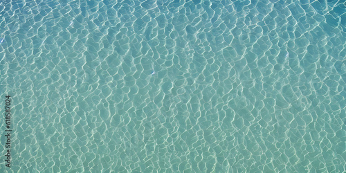 Sea water texture, blue, acqua di mare mossa, fondale sabbioso photo