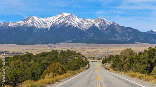 Mount Princeton - A panoramic Spring morning view of Snow-capped Mount Princeton, towering above Buena Vista at Arkansas Valley, as seen from U.S. Route 285, Colorado, USA. photo