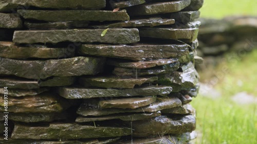 Water dripping down a rock fountain