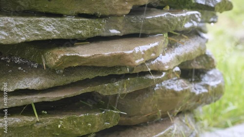 Water dripping down a rock fountain