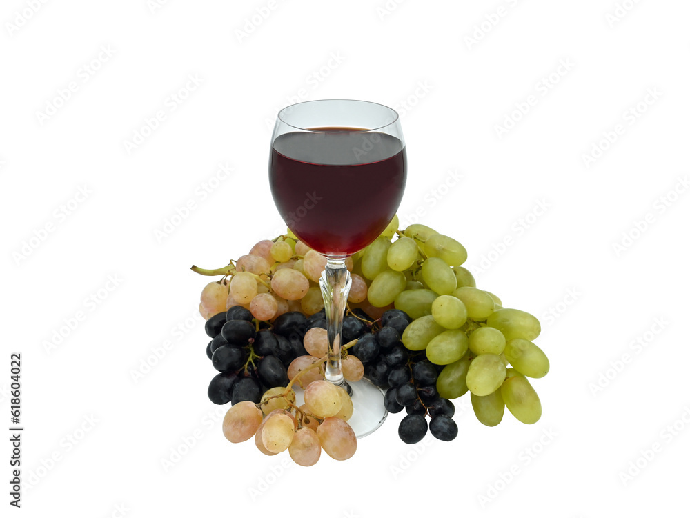 A glass of red wine, a bunch of grapes isolated on a white background