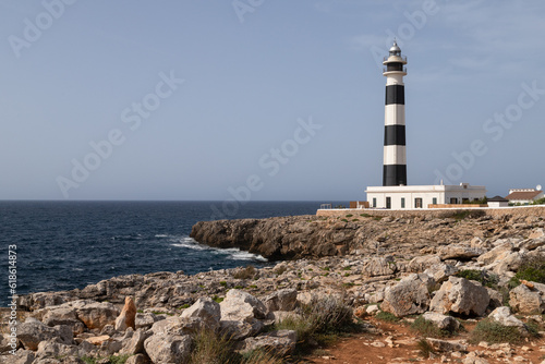 Cap d'Artrutx lighthouse near the town of Cala en Bosch in the southwest of the Spanish island of Menorca.