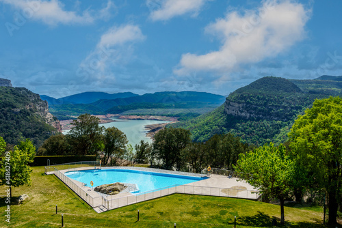 Barcelona, Spain- May 2, 2023. Parador de Turismo de Vic-Sau is a hotel establishment in Masies de Roda, Spain, located at the foot of the Casserres peninsula, in front of the Sau reservoir. photo