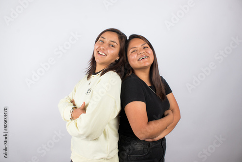 beautiful photograph of a lgbt couple on a light studio background.