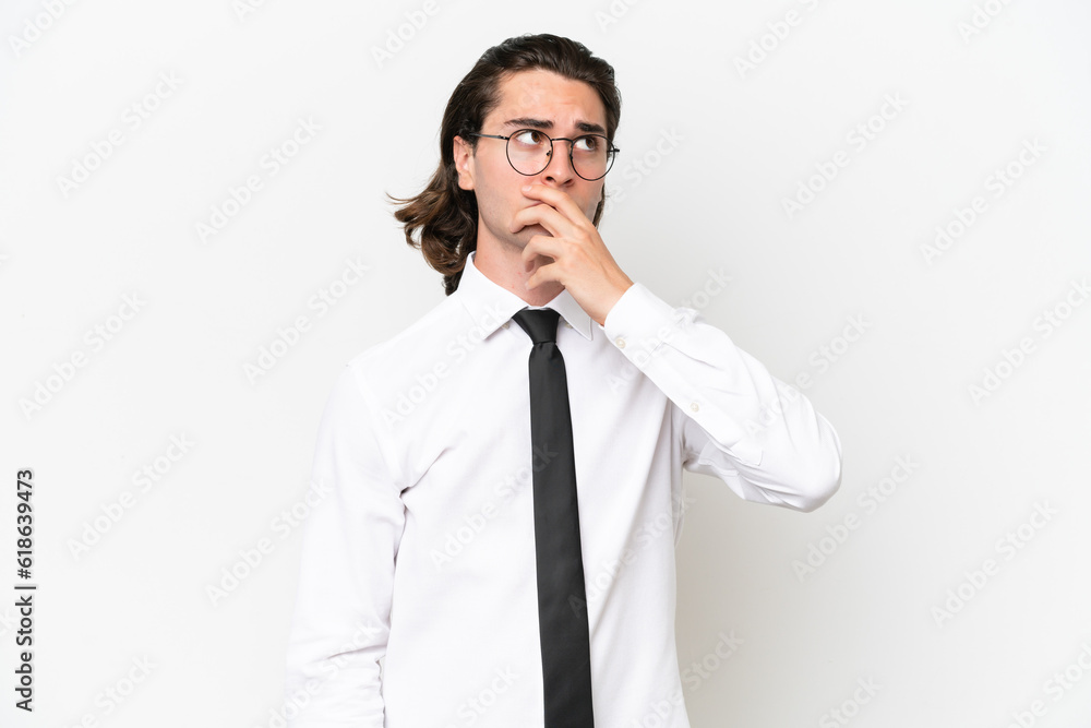 Business handsome man isolated on white background having doubts and with confuse face expression Business handsome man isolated on white background having doubts and with confuse face expression