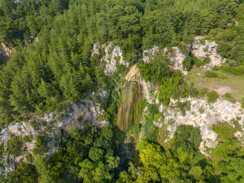 King Pool, a view from top of the Ucansu waterfall cliff to the green forest in Antalya - Turkey photo
