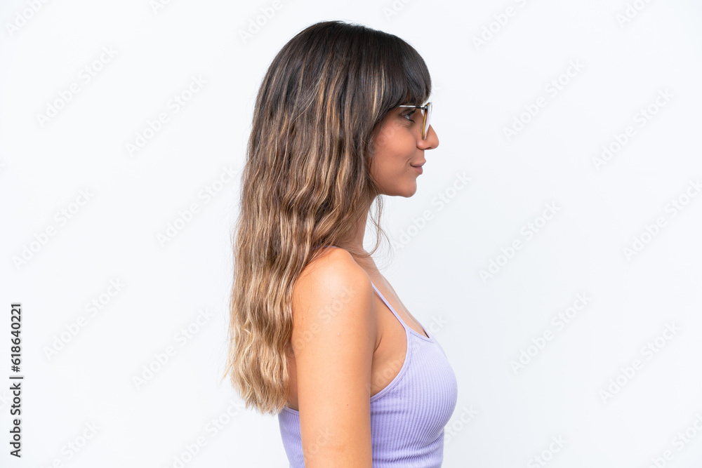Young caucasian woman over isolated background With glasses Young caucasian woman over isolated background With glasses