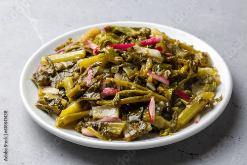 Traditional Turkish appetizers; Aegean Herbs Salad, Radish Salad. Turkish name; ege otlari mezesi or salatasi photo