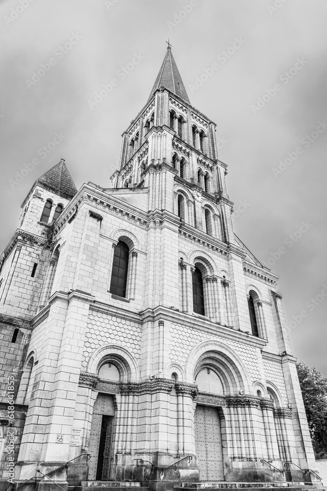 Angers, Loire Valley area, France: Facade of Saint Laud church in romano poitevin architecture style in black and white