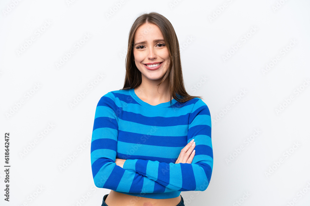 Young pretty caucasian woman isolated on white background keeping the arms crossed in frontal position Young pretty caucasian woman isolated on white background keeping the arms crossed in frontal position