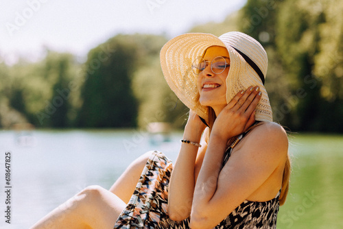 Happy tourist breathing fresh air on beach photo