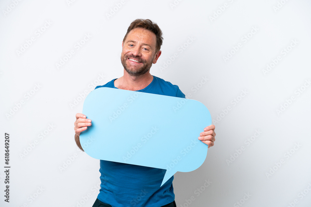 Middle age caucasian man isolated on white background holding an empty speech bubble Middle age caucasian man isolated on white background holding an empty speech bubble