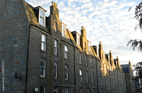 Evening summer sun on typical granite tenements in Aberdeen, Scotland photo