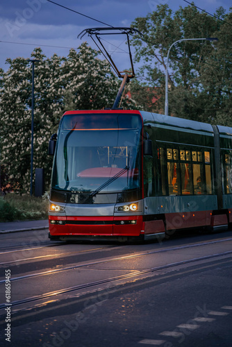 A modern tram in the streets of Prague's old town in 2023.