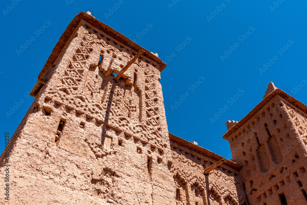 Traditional ornate facade of a Moroccan Kasbah at famous Road of the Kasbahs