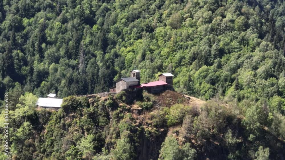 Aerial view of ancient church Lagurka in the village Kala, Holiest temple of Svanetia. Caucasus, Upper Svaneti - UNESCO World Heritage Site. Aerial view of ancient church Lagurka in the village Kala, Holiest temple of Svanetia. Caucasus, Upper Svaneti - UNESCO World Heritage Site.
