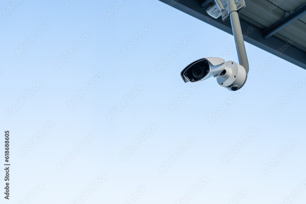 CCTV surveillance security camera video equipment on pole outdoor building safety system area control and copy space. Smart camera theft protection. CCTV surveillance security camera video equipment on pole outdoor building safety system area control and copy space. Smart camera theft protection.