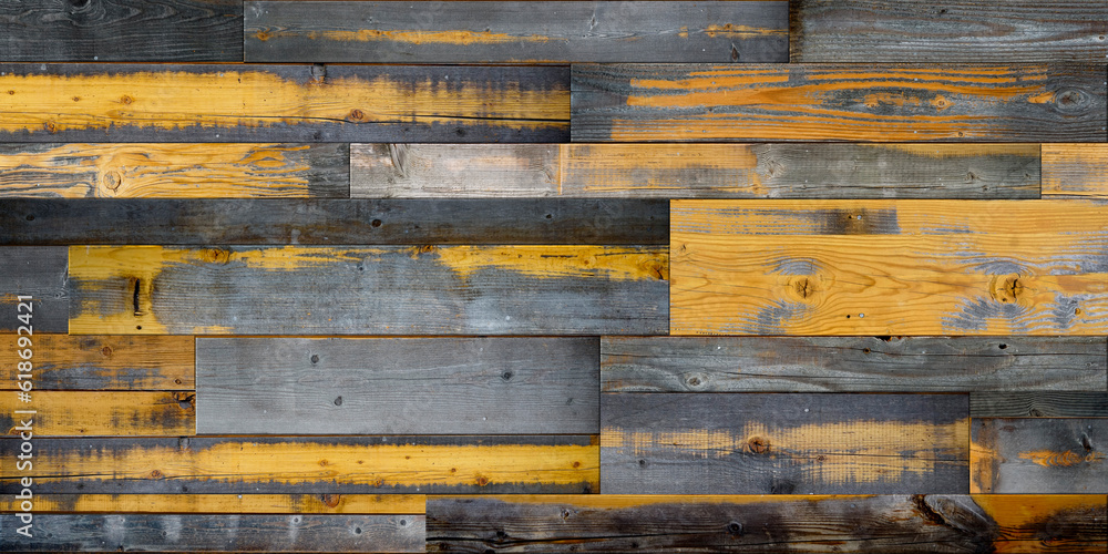Dark stained reclaimed wood surface with aged boards lined up. Wooden