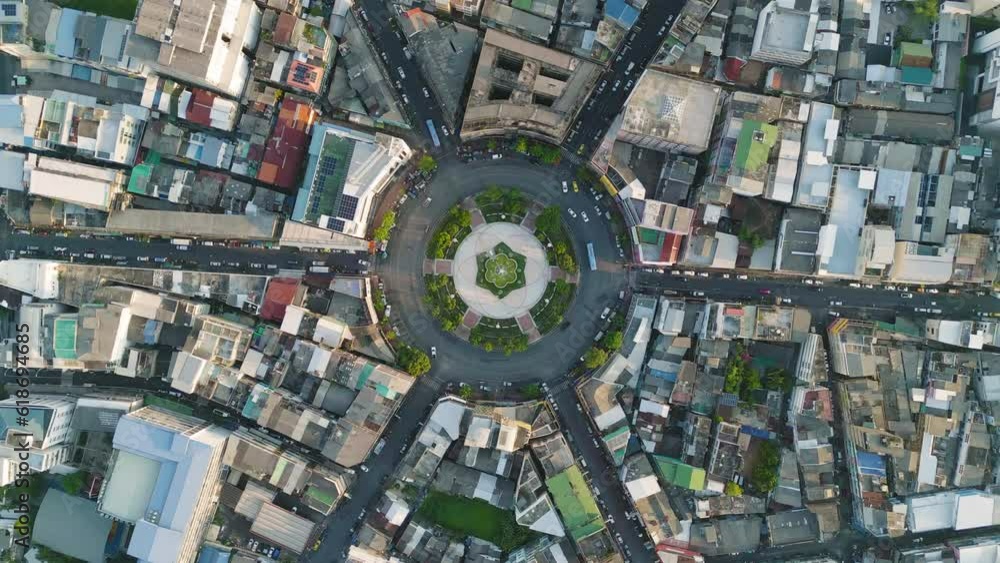 Wongwian Yai roundabout. Aerial view of highway junctions. Roads shape circle in structure of architecture and technology transportation concept. Top view. Urban city, Bangkok, Thailand.