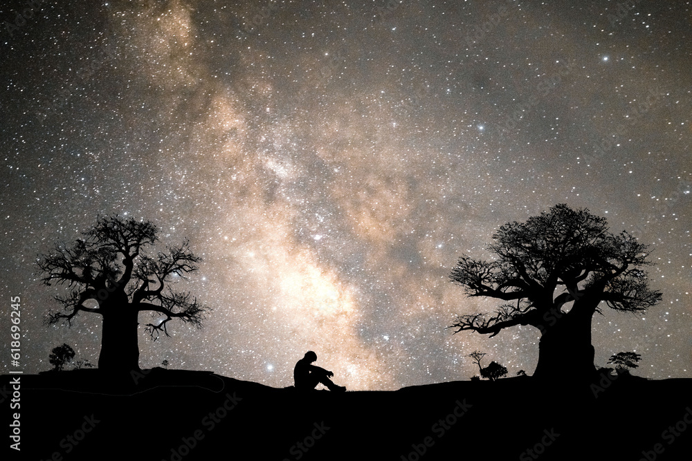 Lonely man, hopeless, heartbroken. At night, the milky way and the stars are beautiful.