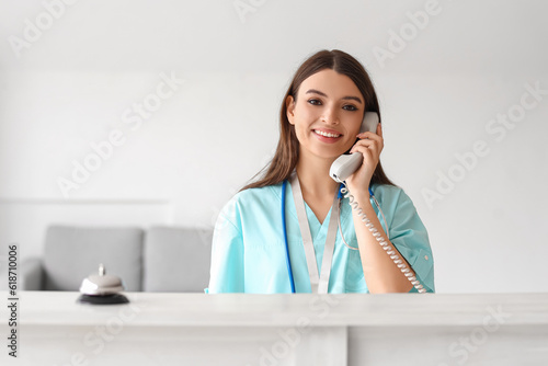 Female medical intern talki...