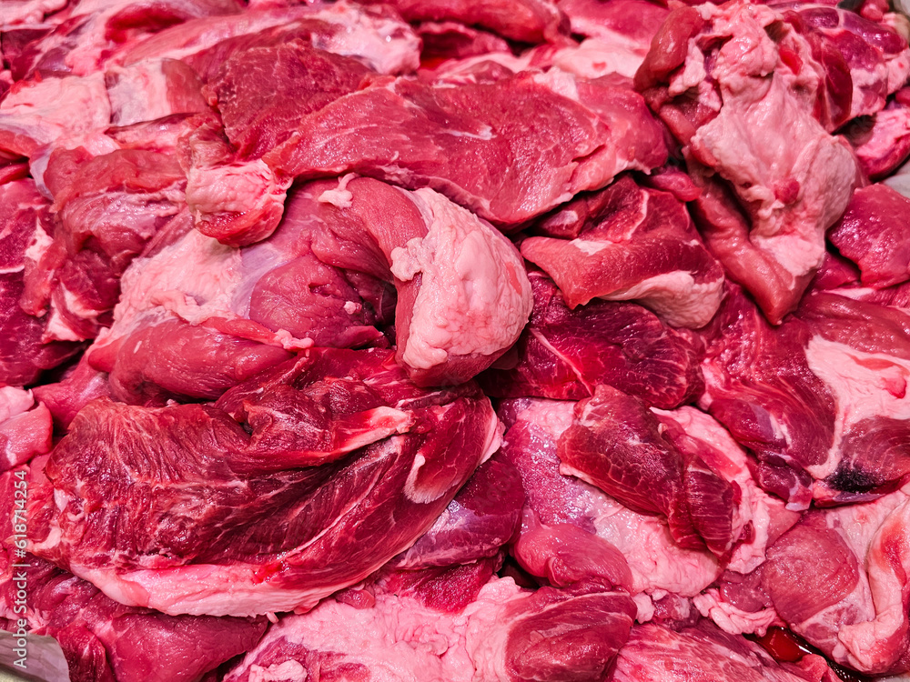 Fresh raw meat, Showcase with raw meat in buther shop. Fresh meat in supermarket. Raw meat background Fresh raw meat, Showcase with raw meat in buther shop. Fresh meat in supermarket. Raw meat background