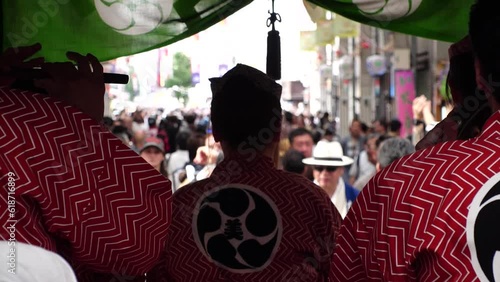 ASAKUSA, TOKYO, JAPAN - 21 MAY 2023 : Scenery of ASAKUSA SANJA MATSURI (Festival). Famous traditional festival in Tokyo. Japanese summer season concept video. Slow motion shot. photo