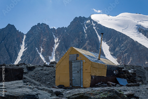 yellow climbers' house in the Altai mountains