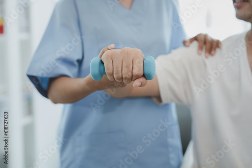 A professional physiotherapist is doing stretching for a patient, the patient has muscle dysfunction due to hard work, most often an office worker who has problems sitting for long periods of time.