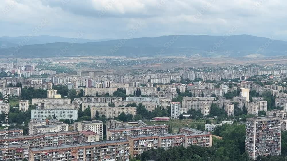 Pan and High Angle View of Suburb Area of Tbilisi Capital City of Georgia in Summer Pan and High Angle View of Suburb Area of Tbilisi Capital City of Georgia in Summer