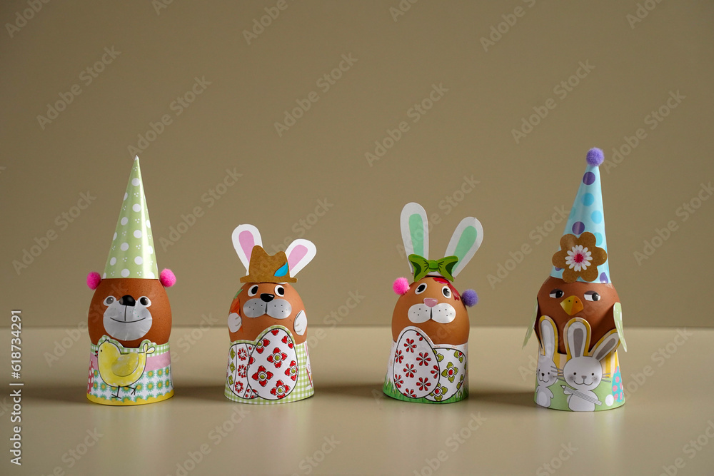 Easter egg figurines DIY. Easter rabbit figurine with colorful eggs. Easter eggs. Funny hares. toy rabbit. toy egg. Statuette easter bunny.