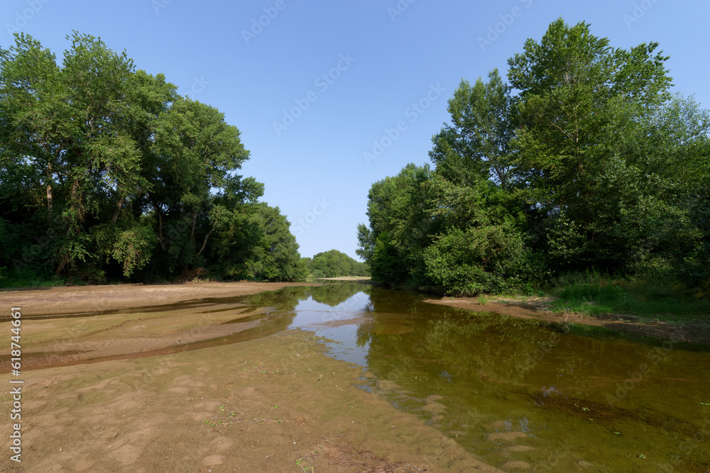 Island in the Loire river bank near Jargeau village Island in the Loire river bank near Jargeau village