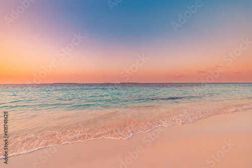 Closeup sand sea wave colorful summer panoramic beach landscape. Coast tropical island and seascape. Orange gold sunset sky  soft sandy calm tranquil Mediterranean relax sunlight  peaceful zen horizon