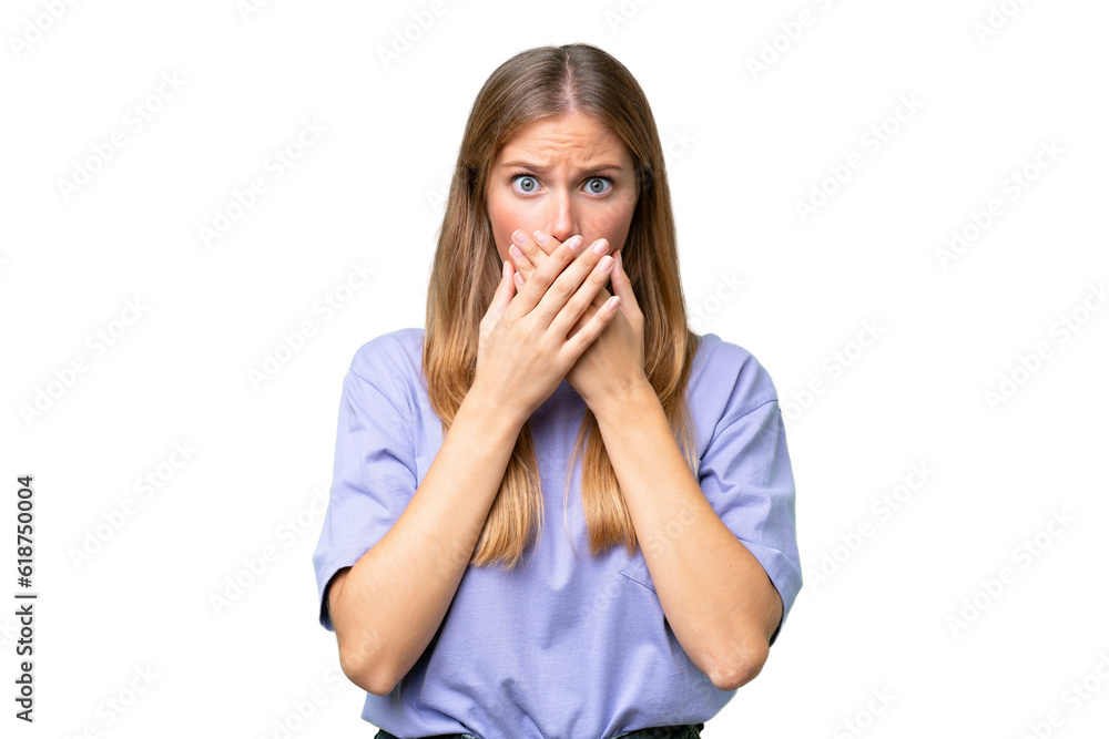 Young beautiful woman over isolated background covering mouth with hands Young beautiful woman over isolated background covering mouth with hands
