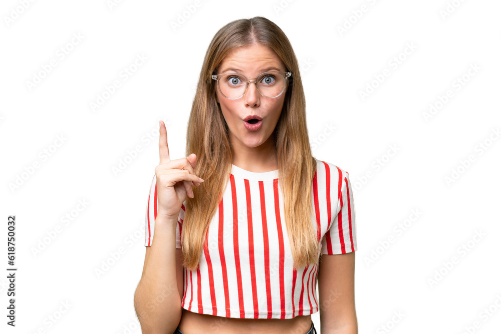 Young beautiful woman over isolated background intending to realizes the solution while lifting a finger up