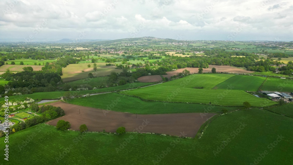 Aerial view of a beautiful green valley with lush vegetation.