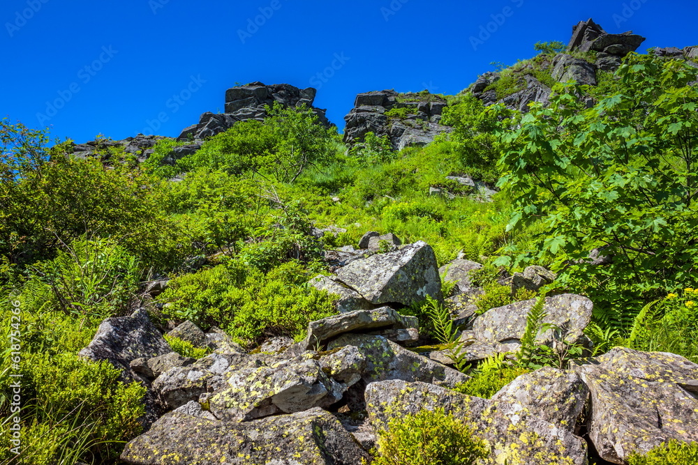 Beautiful view on the Ukrainian Polonynian Beskids to the mountains and valleys. Rocky peaks of the Ukrainian Carpathians in summer. Water-making ridge in the Carpathians, Carpathian mountains Beautiful view on the Ukrainian Polonynian Beskids to the mountains and valleys. Rocky peaks of the Ukrainian Carpathians in summer. Water-making ridge in the Carpathians, Carpathian mountains